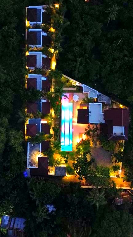 The pool lit up at night